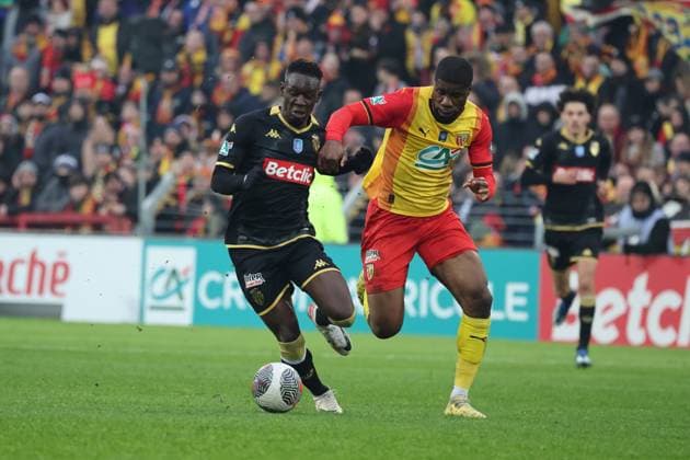 Folarin BALOGUN (Monaco) et Kevin DANSO (RC Lens) lors du match de Coupe de France entre le RC Lens et Monaco, stade Bollaert-Delelis, le 7 janvier 2024 FOOTBALL : RC LENS vs MONACO - COUPE DE FRANCE - 07 01 2024 LaurentSanson Panoramic 