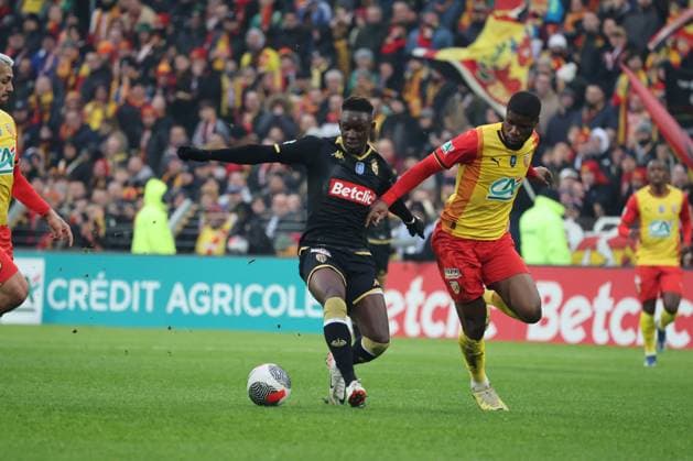 Folarin BALOGUN (Monaco) ert Kevin DANSO (RC Lens) lors du match de Coupe de France entre le RC Lens et Monaco, stade Bollaert-Delelis, le 7 janvier 2024 FOOTBALL : RC LENS vs MONACO - COUPE DE FRANCE - 07 01 2024 LaurentSanson Panoramic 