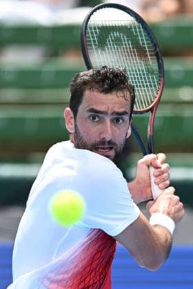 TENNIS KOOYONG CLASSIC, Marin Cilic of Croatia in action against Andy Murray of Great Britain during their match in the 2024 Kooyong Classic at the Kooyong Lawn Tennis Club in Melbourne, Wednesday, January 10, 2024. ( NO ARCHIVING, EDITORIAL USE ONLY, NO USE IN BOOKS WITHOUT CONSENT MELBOURNE VICTORIA AUSTRALIA  Copyright: xJOELxCARRETTx 20240110001887037277