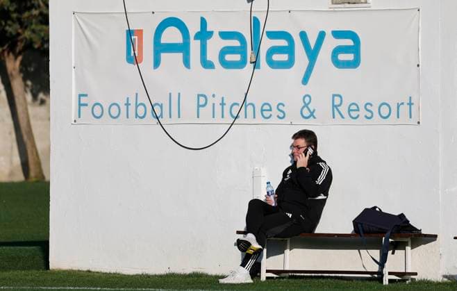 10 01 2024 Soccer 2 Soccer Bundesliga Season 2023 2024 1 FC Nuremberg FCN Club Training Camp Winter Winter Training Camp Marbella Spain Sports Photo Zinc DaMa xdaxmax Dieter Hecking Board of Directors Sports 1 FC Nuremberg FCN on the phone at the sports field