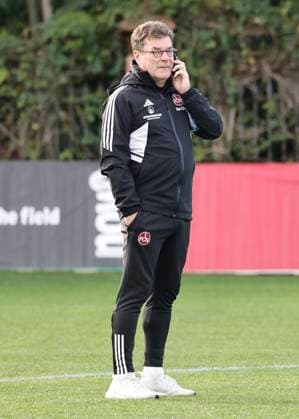 10 01 2024 Soccer 2 Soccer Bundesliga Season 2023 2024 1 FC Nuremberg FCN Club Training Camp Winter Winter Training Camp Marbella Spain Sports Photo Zinc DaMa xdaxmax Dieter Hecking Board of Directors Sports 1 FC Nuremberg FCN on the phone at the sports field