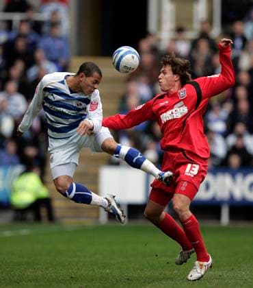 Coca Cola Championship Soccer: Reading v Ipswich Town MAR 14 Liam Rosenior of Reading challenges Luciano Civelli of Ipswich Town..Coca Cola Championship..Reading v Ipswich Town..14th March, 2009.(Credit Image: Â PHOTOGRAPHER Sportimage Cal Media) UK EDITORIAL USE ONLY Copyright: xx 20090314_zaf_si1_032.jpg JakexBadgerx csmphoto218065
