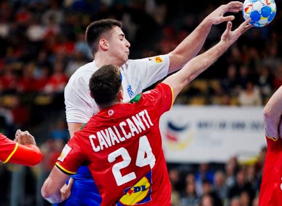 Greece s Achilleas Toskas and Portugal s Alexandre Cavalcanti during the EHF Euro 2024 mens match between Greece and Portugal at the Olympiahalle in Munich, Germany, Thursday January 11, 2024 , Munich Germany  Copyright: Ritzau Scanpix LiselottexSabroex spdk20240111-192411-L