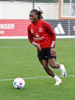 13 01 2024 Soccer 2 Soccer Bundesliga Season 2023 2024 1 FC Nuremberg FCN Club Training Camp Winter Winter Training Camp Marbella Spain Sports Photo Zinc DaMa xdaxmax Joseph Hungbo 23, 1 FC Nuremberg FCN laughs laughter rejoices joy