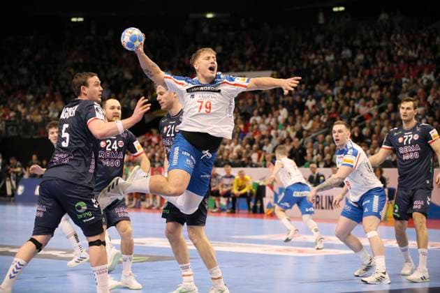 Photo Teis Horn Rasmussen Faroe Islands throws against Sander Sagosen Norway , left European Handball Championship, preliminary round in Berlin , Norway Faroe Islands on Sat 13 01 2024 Claus Bergmann DFL regulations prohibit any use of photographs as image sequences and or quasi video