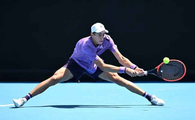 TENNIS AUSTRALIAN OPEN, Matteo Arnaldi of Italy returns to Adam Walton of Australia during their 1st round match on Day 1 of the 2024 Australian Open at Melbourne Park in Melbourne, Sunday, January 14, 2024. ( NO ARCHIVING, EDITORIAL USE ONLY, NO USE IN BOOKS WITHOUT CONSENT MELBOURNE VICTORIA AUSTRALIA  Copyright: xJAMESxROSSx 20240114001888691308