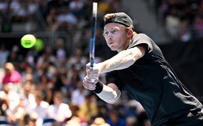 TENNIS AUSTRALIAN OPEN, Dane Sweeny of Australia returns during his first round match against Francisco Cerundolo of Argentina on Day 1 of the 2024 Australian Open at Melbourne Park in Melbourne, Sunday, January 14, 2024. ( NO ARCHIVING, EDITORIAL USE ONLY, NO USE IN BOOKS WITHOUT CONSENT MELBOURNE VICTORIA AUSTRALIA  Copyright: xJAMESxROSSx 20240114001888731283