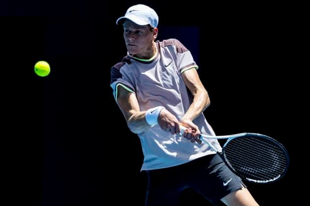 MELBOURNE, VIC - JANUARY 14: Jannik Sinner of Italy in action during Round 1 of the 2024 Australian Open on January 14 2024, at Melbourne Park in Melbourne, Australia. (Photo by Jason Heidrich Icon Sportswire) TENNIS: JAN 14 Australian Open EDITORIAL USE ONLY Icon240114087