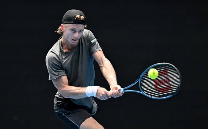 TENNIS AUSTRALIAN OPEN, Dane Sweeny of Australia returns during his first round match against Francisco Cerundolo of Argentina on Day 1 of the 2024 Australian Open at Melbourne Park in Melbourne, Sunday, January 14, 2024. ( NO ARCHIVING, EDITORIAL USE ONLY, NO USE IN BOOKS WITHOUT CONSENT MELBOURNE VICTORIA AUSTRALIA  Copyright: xJAMESxROSSx 20240114001888747635