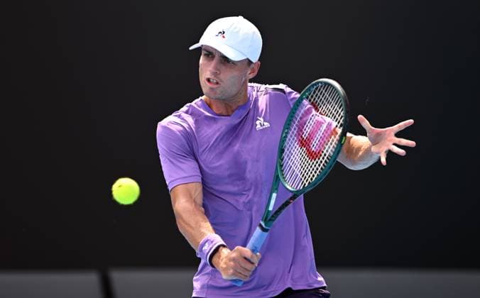 TENNIS AUSTRALIAN OPEN, Christopher O?Connell of Australia returns during his first round match against Cristian Garin of Chile on Day 1 of the 2024 Australian Open at Melbourne Park in Melbourne, Sunday, January 14, 2024. ( NO ARCHIVING, EDITORIAL USE ONLY, NO USE IN BOOKS WITHOUT CONSENT MELBOURNE VICTORIA AUSTRALIA  Copyright: xJOELxCARRETTx 20240114001888766522