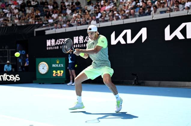 TENNIS AUSTRALIAN OPEN, Francisco Cerundolo of Argentina returns during his first round match against Dane Sweeny of Australia on Day 1 of the 2024 Australian Open at Melbourne Park in Melbourne, Sunday, January 14, 2024. ( NO ARCHIVING, EDITORIAL USE ONLY, NO USE IN BOOKS WITHOUT CONSENT MELBOURNE VICTORIA AUSTRALIA  Copyright: xJAMESxROSSx 20240114001888766754