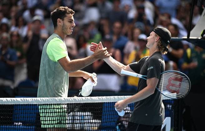 TENNIS AUSTRALIAN OPEN, Francisco Cerundolo of Argentina (left) is congratulated by Dane Sweeny of Australia following his first round win on Day 1 of the 2024 Australian Open at Melbourne Park in Melbourne, Sunday, January 14, 2024. ( NO ARCHIVING, EDITORIAL USE ONLY, NO USE IN BOOKS WITHOUT CONSENT MELBOURNE VICTORIA AUSTRALIA  Copyright: xJAMESxROSSx 20240114001888769506