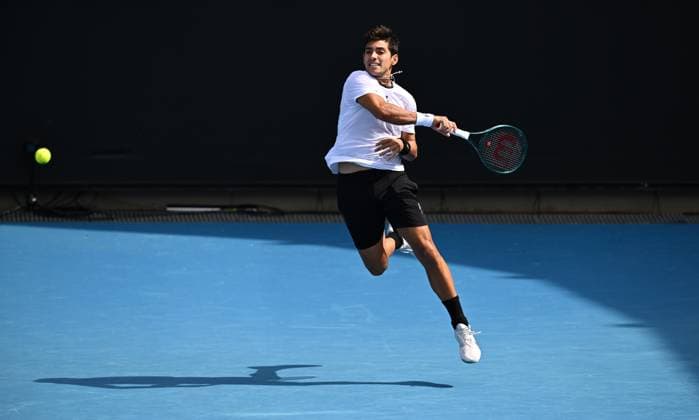 TENNIS AUSTRALIAN OPEN, Cristian Garin of Chile returns during his first round match against Christopher O?Connell of Australia on Day 1 of the 2024 Australian Open at Melbourne Park in Melbourne, Sunday, January 14, 2024. ( NO ARCHIVING, EDITORIAL USE ONLY, NO USE IN BOOKS WITHOUT CONSENT MELBOURNE VICTORIA AUSTRALIA  Copyright: xJOELxCARRETTx 20240114001888774277