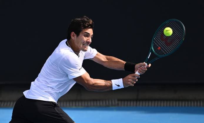TENNIS AUSTRALIAN OPEN, Cristian Garin of Chile returns during his first round match against Christopher O?Connell of Australia on Day 1 of the 2024 Australian Open at Melbourne Park in Melbourne, Sunday, January 14, 2024. ( NO ARCHIVING, EDITORIAL USE ONLY, NO USE IN BOOKS WITHOUT CONSENT MELBOURNE VICTORIA AUSTRALIA  Copyright: xJOELxCARRETTx 20240114001888774593