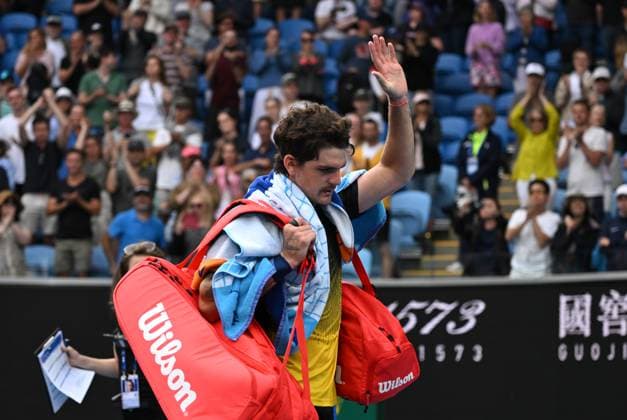 TENNIS AUSTRALIAN OPEN, Thiago Seyboth Wild of Brazil departs following his first round loss to Andrey Rublev of Russia on Day 1 of the 2024 Australian Open at Melbourne Park in Melbourne, Sunday, January 14, 2024. ( NO ARCHIVING, EDITORIAL USE ONLY, NO USE IN BOOKS WITHOUT CONSENT MELBOURNE VICTORIA AUSTRALIA  Copyright: xLUKASxCOCHx 20240114001888787730