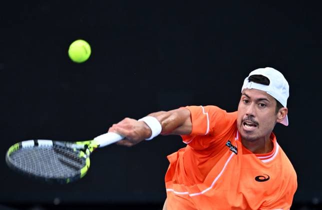 TENNIS AUSTRALIAN OPEN, Jason Kubler of Australia serves during his first round match against Daniel Elahi Galan of Chile on Day 1 of the 2024 Australian Open at Melbourne Park in Melbourne, Sunday, January 14, 2024. ( NO ARCHIVING, EDITORIAL USE ONLY, NO USE IN BOOKS WITHOUT CONSENT MELBOURNE VICTORIA AUSTRALIA  Copyright: xJOELxCARRETTx 20240114001888788704