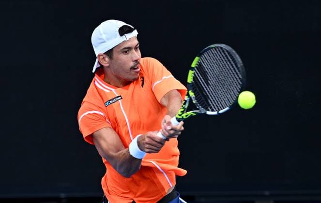 TENNIS AUSTRALIAN OPEN, Jason Kubler of Australia returns during his first round match against Daniel Elahi Galan of Chile on Day 1 of the 2024 Australian Open at Melbourne Park in Melbourne, Sunday, January 14, 2024. ( NO ARCHIVING, EDITORIAL USE ONLY, NO USE IN BOOKS WITHOUT CONSENT MELBOURNE VICTORIA AUSTRALIA  Copyright: xJOELxCARRETTx 20240114001888789322