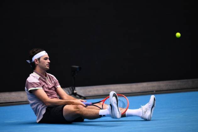 Taylor Fritz (USA) falls to the ground during his first round match Australian Open, Day One, Tennis, Melbourne Park, Melbourne, Australia - 14 Jan 2024  Copyright: xJamesxGourley Shutterstockx 14297568gp