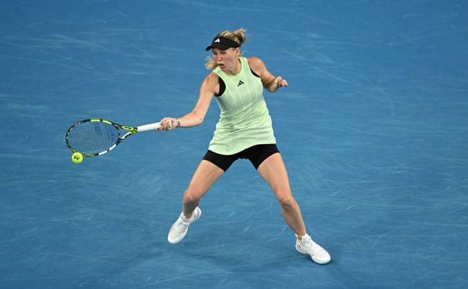 TENNIS AUSTRALIAN OPEN, Caroline Wozniacki of Denmark returns during her first round match against Magda Linette of Poland on Day 1 of the 2024 Australian Open at Melbourne Park in Melbourne, Sunday, January 14, 2024. ( NO ARCHIVING, EDITORIAL USE ONLY, NO USE IN BOOKS WITHOUT CONSENT MELBOURNE VICTORIA AUSTRALIA  Copyright: xLUKASxCOCHx 20240114001888807120