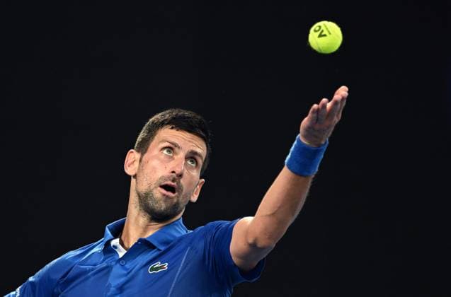 TENNIS AUSTRALIAN OPEN, Novak Djokovic of Serbia prepares to serve during his first round match against Dino Prizmic of Croatia on Day 1 of the 2024 Australian Open at Melbourne Park in Melbourne, Sunday, January 14, 2024. ( NO ARCHIVING, EDITORIAL USE ONLY, NO USE IN BOOKS WITHOUT CONSENT MELBOURNE VICTORIA AUSTRALIA  Copyright: xLUKASxCOCHx 20240114001888808853
