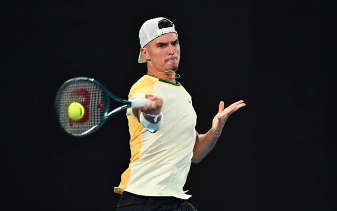 TENNIS AUSTRALIAN OPEN, Dino Prizmic of Croatia returns during his first round match against Novak Djokovic of Serbia on Day 1 of the 2024 Australian Open at Melbourne Park in Melbourne, Sunday, January 14, 2024. ( NO ARCHIVING, EDITORIAL USE ONLY, NO USE IN BOOKS WITHOUT CONSENT MELBOURNE VICTORIA AUSTRALIA  Copyright: xLUKASxCOCHx 20240114001888809348