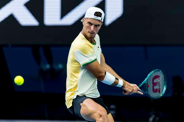 MELBOURNE, VIC - JANUARY 14: Dino Prizmic of Croatia in action during Round 1 of the 2024 Australian Open on January 14 2024, at Melbourne Park in Melbourne, Australia. (Photo by Jason Heidrich Icon Sportswire) TENNIS: JAN 14 Australian Open EDITORIAL USE ONLY Icon240114217