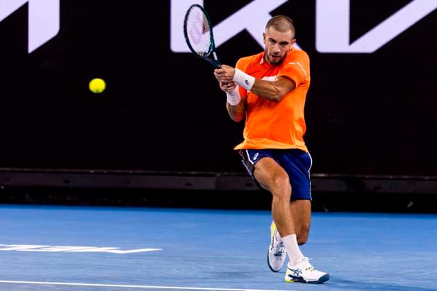 MELBOURNE, VIC - JANUARY 14: Borna Coric of Croatia in action during Round 1 of the 2024 Australian Open on January 14 2024, at Melbourne Park in Melbourne, Australia. (Photo by Jason Heidrich Icon Sportswire) TENNIS: JAN 14 Australian Open EDITORIAL USE ONLY Icon240114288