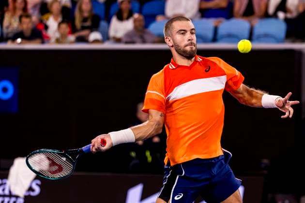 MELBOURNE, VIC - JANUARY 14: Borna Coric of Croatia in action during Round 1 of the 2024 Australian Open on January 14 2024, at Melbourne Park in Melbourne, Australia. (Photo by Jason Heidrich Icon Sportswire) TENNIS: JAN 14 Australian Open EDITORIAL USE ONLY Icon240114295
