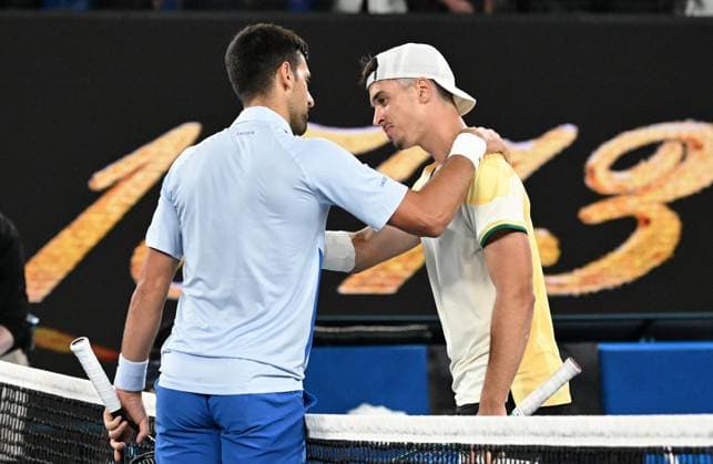 TENNIS AUSTRALIAN OPEN, Novak Djokovic of Serbia (left) reacts with Dino Prizmic of Croatia following their first round match on Day 1 of the 2024 Australian Open at Melbourne Park in Melbourne, Sunday, January 14, 2024. ( NO ARCHIVING, EDITORIAL USE ONLY, NO USE IN BOOKS WITHOUT CONSENT MELBOURNE VICTORIA AUSTRALIA  Copyright: xLUKASxCOCHx 20240114001888867124