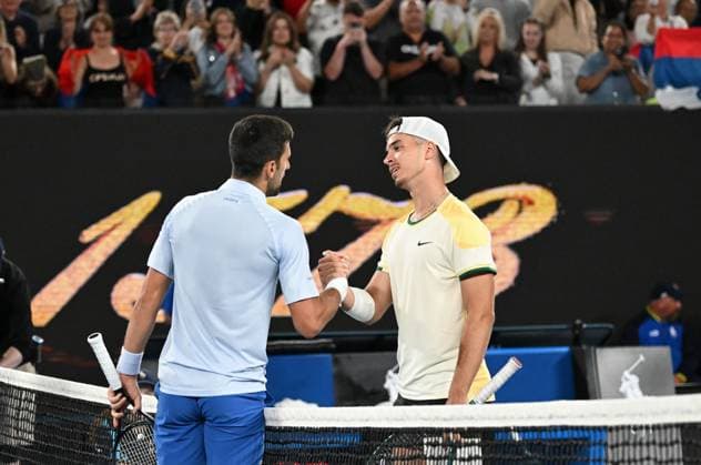 TENNIS AUSTRALIAN OPEN, Novak Djokovic of Serbia (left) reacts with Dino Prizmic of Croatia following their first round match on Day 1 of the 2024 Australian Open at Melbourne Park in Melbourne, Sunday, January 14, 2024. ( NO ARCHIVING, EDITORIAL USE ONLY, NO USE IN BOOKS WITHOUT CONSENT MELBOURNE VICTORIA AUSTRALIA  Copyright: xLUKASxCOCHx 20240114001888867616