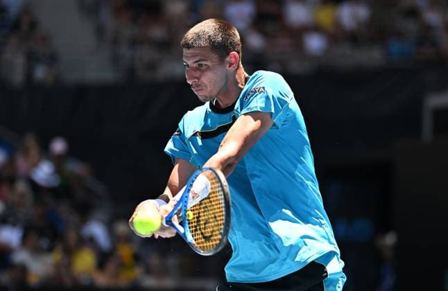 TENNIS AUSTRALIAN OPEN, Alexei Popyrin of Australia returns during his first round match against Marc Polmans of Australia on Day 2 of the 2024 Australian Open at Melbourne Park in Melbourne, Monday, January 15, 2024. ( NO ARCHIVING, EDITORIAL USE ONLY, NO USE IN BOOKS WITHOUT CONSENT MELBOURNE VICTORIA AUSTRALIA  Copyright: xJAMESxROSSx 20240115001889169243