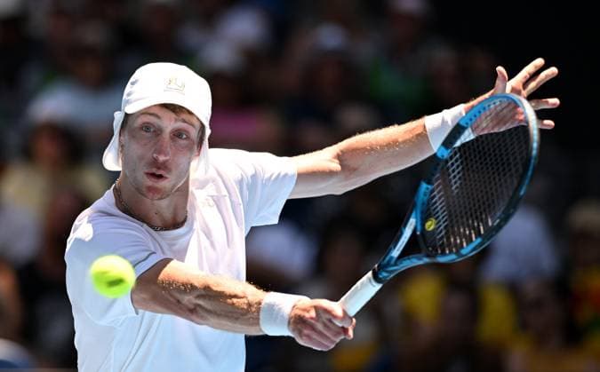 TENNIS AUSTRALIAN OPEN, Marc Polmans of Australia returns during his first round match against Alexei Popyrin of Australia on Day 2 of the 2024 Australian Open at Melbourne Park in Melbourne, Monday, January 15, 2024. ( NO ARCHIVING, EDITORIAL USE ONLY, NO USE IN BOOKS WITHOUT CONSENT MELBOURNE VICTORIA AUSTRALIA  Copyright: xJAMESxROSSx 20240115001889169447
