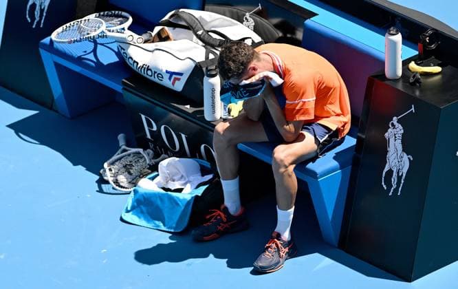 TENNIS AUSTRALIAN OPEN, Terence Atmane of France reacts after retiring from his first round match against Daniil Medvedev of Russia on Day 2 of the 2024 Australian Open at Melbourne Park in Melbourne, Monday, January 15, 2024. ( NO ARCHIVING, EDITORIAL USE ONLY, NO USE IN BOOKS WITHOUT CONSENT MELBOURNE VICTORIA AUSTRALIA  Copyright: xLUKASxCOCHx 20240115001889190449