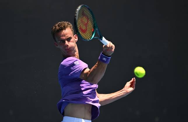 TENNIS AUSTRALIAN OPEN, Luca Van Assche of France in action during his first round match against James Duckworth of Australia on Day 2 of the 2024 Australian Open at Melbourne Park in Melbourne, Monday, January 15, 2024. ( NO ARCHIVING, EDITORIAL USE ONLY, NO USE IN BOOKS WITHOUT CONSENT MELBOURNE VICTORIA AUSTRALIA  Copyright: xLUKASxCOCHx 20240115001889191613