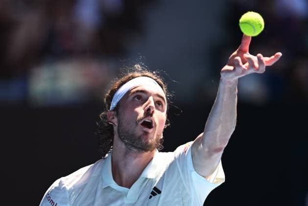 TENNIS AUSTRALIAN OPEN, Stefanos Tsitsipas of Greece prepares to serve during his first round match against Zizou Bergs of Belgium on Day 2 of the 2024 Australian Open at Melbourne Park in Melbourne, Monday, January 15, 2024. ( NO ARCHIVING, EDITORIAL USE ONLY, NO USE IN BOOKS WITHOUT CONSENT MELBOURNE VICTORIA AUSTRALIA  Copyright: xJOELxCARRETTx 20240115001889200505
