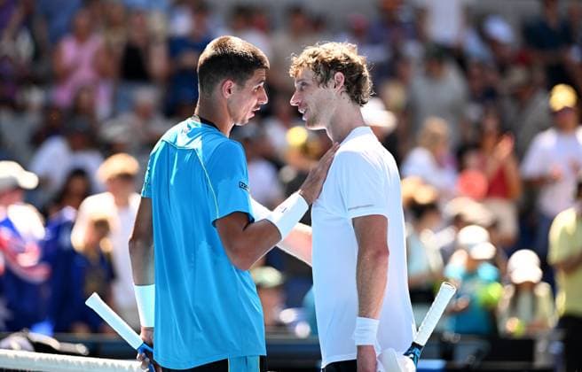 TENNIS AUSTRALIAN OPEN, Alexei Popyrin of Australia (left) and reacts with t Marc Polmans of Australia following their first round match on Day 2 of the 2024 Australian Open at Melbourne Park in Melbourne, Monday, January 15, 2024. ( NO ARCHIVING, EDITORIAL USE ONLY, NO USE IN BOOKS WITHOUT CONSENT MELBOURNE VICTORIA AUSTRALIA  Copyright: xJAMESxROSSx 20240115001889201281