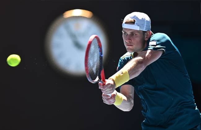 TENNIS AUSTRALIAN OPEN, Zizou Bergs of Belgium returns during his first round match against Stefanos Tsitsipas of Greece on Day 2 of the 2024 Australian Open at Melbourne Park in Melbourne, Monday, January 15, 2024. ( NO ARCHIVING, EDITORIAL USE ONLY, NO USE IN BOOKS WITHOUT CONSENT MELBOURNE VICTORIA AUSTRALIA  Copyright: xJOELxCARRETTx 20240115001889204276