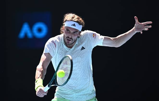 TENNIS AUSTRALIAN OPEN, Stefanos Tsitsipas of Greece returns during his first round match against Zizou Bergs of Belgium on Day 2 of the 2024 Australian Open at Melbourne Park in Melbourne, Monday, January 15, 2024. ( NO ARCHIVING, EDITORIAL USE ONLY, NO USE IN BOOKS WITHOUT CONSENT MELBOURNE VICTORIA AUSTRALIA  Copyright: xJOELxCARRETTx 20240115001889206307