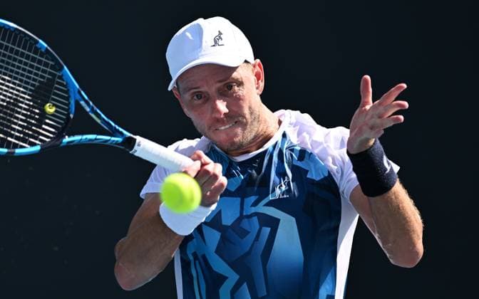 TENNIS AUSTRALIAN OPEN, James Duckworth of Australia returns during his first round match against Luca Van Assche of France on Day 2 of the 2024 Australian Open at Melbourne Park in Melbourne, Monday, January 15, 2024. ( NO ARCHIVING, EDITORIAL USE ONLY, NO USE IN BOOKS WITHOUT CONSENT MELBOURNE VICTORIA AUSTRALIA  Copyright: xLUKASxCOCHx 20240115001889217600