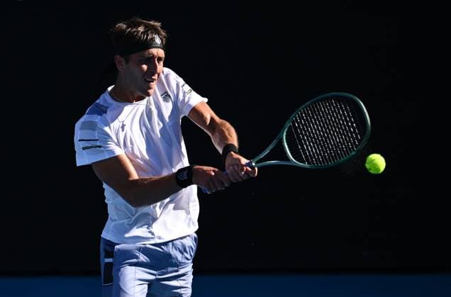 TENNIS AUSTRALIAN OPEN, Tomas Martin Etcheverry of Argentina returns during his first round match against Andy Murray of Great Britain on Day 2 of the 2024 Australian Open at Melbourne Park in Melbourne, Monday, January 15, 2024. ( NO ARCHIVING, EDITORIAL USE ONLY, NO USE IN BOOKS WITHOUT CONSENT MELBOURNE VICTORIA AUSTRALIA  Copyright: xJOELxCARRETTx 20240115001889224253