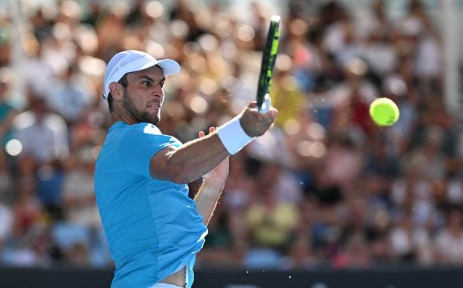 TENNIS AUSTRALIAN OPEN, Aleksandar Vukic of Australia returns during his first round match against Jordan Thompson of Australia on Day 2 of the 2024 Australian Open at Melbourne Park in Melbourne, Monday, January 15, 2024. ( NO ARCHIVING, EDITORIAL USE ONLY, NO USE IN BOOKS WITHOUT CONSENT MELBOURNE VICTORIA AUSTRALIA  Copyright: xLUKASxCOCHx 20240115001889238903