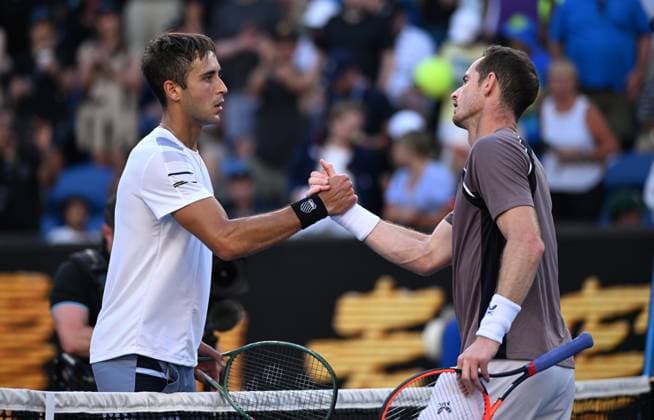 TENNIS AUSTRALIAN OPEN, Tomas Martin Etcheverry of Argentina (left) shakes hands after defeating Andy Murray of Great Britain in their first round match on Day 2 of the 2024 Australian Open at Melbourne Park in Melbourne, Monday, January 15, 2024. ( NO ARCHIVING, EDITORIAL USE ONLY, NO USE IN BOOKS WITHOUT CONSENT MELBOURNE VICTORIA AUSTRALIA  Copyright: xJAMESxROSSx 20240115001889241241