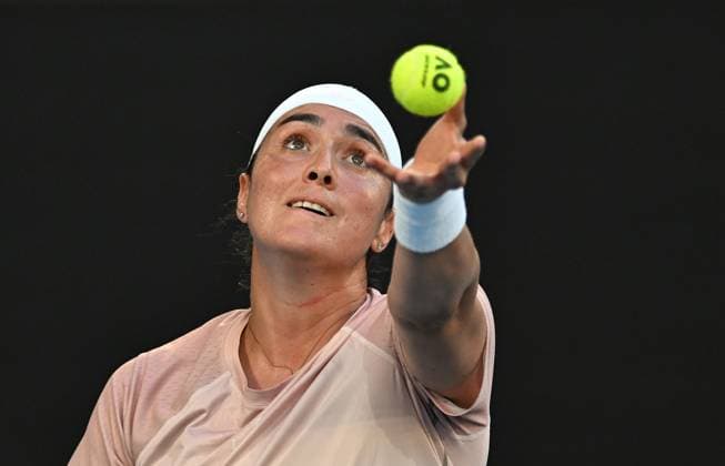 TENNIS AUSTRALIAN OPEN, Ons Jabeur of Tunisia prepares to serve during her first round match against Yulila Starodubtseva of Ukraine on Day 2 of the 2024 Australian Open at Melbourne Park in Melbourne, Monday, January 15, 2024. ( NO ARCHIVING, EDITORIAL USE ONLY, NO USE IN BOOKS WITHOUT CONSENT MELBOURNE VICTORIA AUSTRALIA  Copyright: xLUKASxCOCHx 20240115001889249110