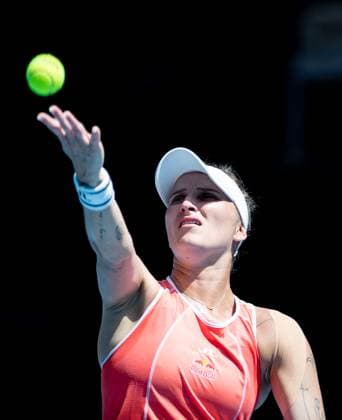 (240115) -- MELBOURNE, Jan. 15, 2024 -- Marketa Vondrousova of the Czech Republic serves to Dayana Yastremska of Ukraine during the women s singles 1st round match at Australian Open tennis tournament in Melbourne, Australia, Jan. 15, 2024. ) (SP)AUSTRALIA-MELBOURNE-TENNIS-AUSTRALIAN OPEN-WOMEN S SINGLES HuxJingchen 