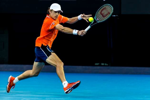 MELBOURNE, VIC - JANUARY 15: Alex de Minaur of Australia in action during Round 1 of the 2024 Australian Open on January 15 2024, at Melbourne Park in Melbourne, Australia. (Photo by Jason Heidrich Icon Sportswire) TENNIS: JAN 15 Australian Open EDITORIAL USE ONLY Icon240115236