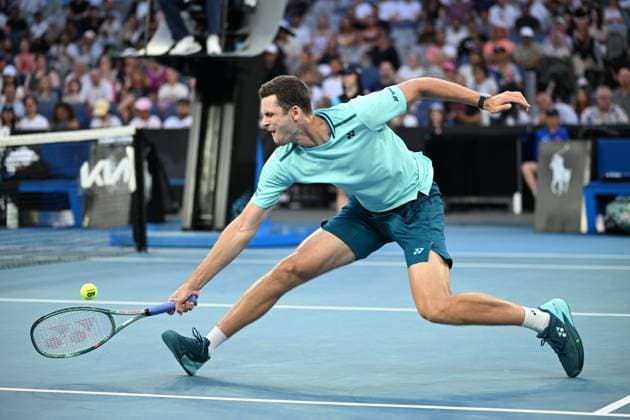TENNIS AUSTRALIAN OPEN, Hubert Hurkacz of Poland in action during his first round match against Omar Jasika of Australia on Day 2 of the 2024 Australian Open at Melbourne Park in Melbourne, Monday, January 15, 2024. ( NO ARCHIVING, EDITORIAL USE ONLY, NO USE IN BOOKS WITHOUT CONSENT MELBOURNE VICTORIA AUSTRALIA  Copyright: xJAMESxROSSx 20240115001889278665