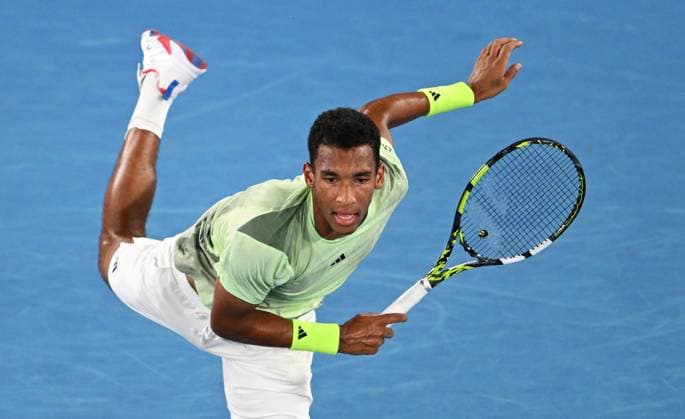 TENNIS AUSTRALIAN OPEN, Felix Auger-Aliassime of Canada in action during his first round match against Domonic Thiem of Austria on Day 2 of the 2024 Australian Open at Melbourne Park in Melbourne, Monday, January 15, 2024. ( NO ARCHIVING, EDITORIAL USE ONLY, NO USE IN BOOKS WITHOUT CONSENT MELBOURNE VICTORIA AUSTRALIA  Copyright: xLUKASxCOCHx 20240115001889282693