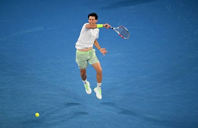 TENNIS AUSTRALIAN OPEN, Domonic Thiem of Austria returns during his first round match against Felix Auger-Aliassime of Canada on Day 2 of the 2024 Australian Open at Melbourne Park in Melbourne, Monday, January 15, 2024. ( NO ARCHIVING, EDITORIAL USE ONLY, NO USE IN BOOKS WITHOUT CONSENT MELBOURNE VICTORIA AUSTRALIA  Copyright: xLUKASxCOCHx 20240115001889283033