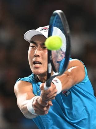 TENNIS AUSTRALIAN OPEN, Rinky Hijikata of Australia returns during his first round match against Jan-Lennard Struff of Germany on Day 2 of the 2024 Australian Open at Melbourne Park in Melbourne, Monday, January 15, 2024. ( NO ARCHIVING, EDITORIAL USE ONLY, NO USE IN BOOKS WITHOUT CONSENT MELBOURNE VICTORIA AUSTRALIA  Copyright: xLUKASxCOCHx 20240115001889285351