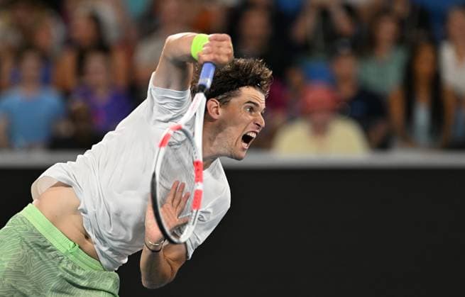 TENNIS AUSTRALIAN OPEN, Domonic Thiem of Austria serves during his first round match against Felix Auger-Aliassime of Canada on Day 2 of the 2024 Australian Open at Melbourne Park in Melbourne, Monday, January 15, 2024. ( NO ARCHIVING, EDITORIAL USE ONLY, NO USE IN BOOKS WITHOUT CONSENT MELBOURNE VICTORIA AUSTRALIA  Copyright: xLUKASxCOCHx 20240115001889290182